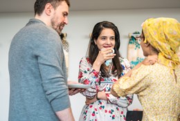 People chatting with a coffee
